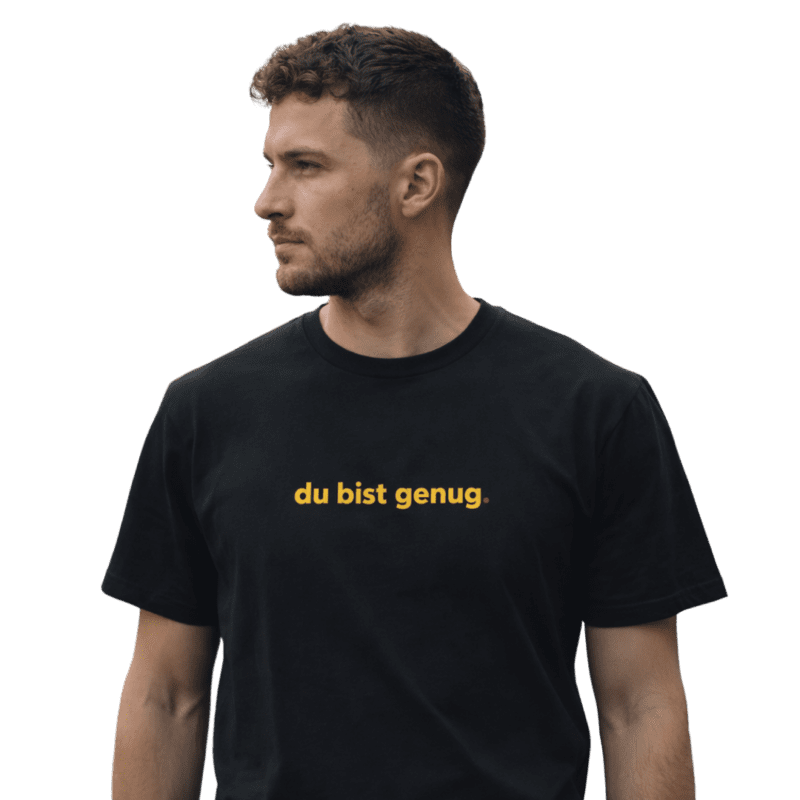 man wearing a german you are enough tshirt