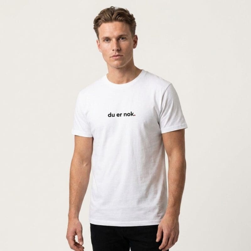 Man wearing white T-shirt with printed slogan