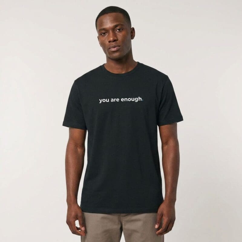 Man wearing black T-shirt with slogan