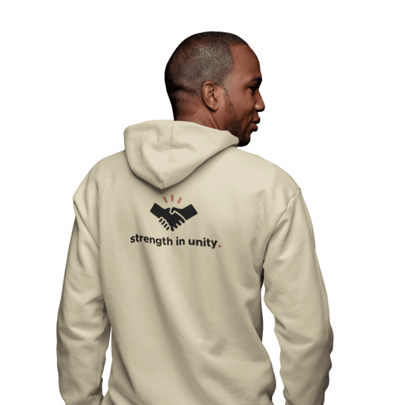 Man wearing hoodie with handshake design and slogan.