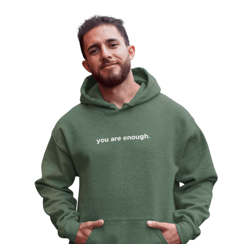 Man wearing green hoodie with motivational text