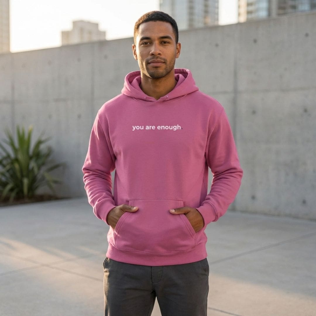 you-are-enough-mens-pink-hoodie-urban Man wearing pink hoodie with positive message
