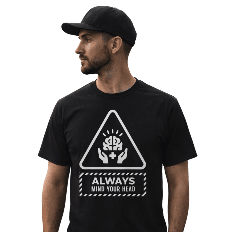 Man wearing 'Always Mind Your Head' t-shirt and cap.
