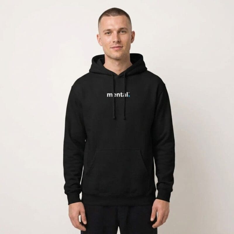 Man wearing black hoodie with 'mental.' logo