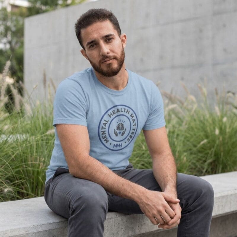 Man wearing Mental Health Matters T-shirt outdoors