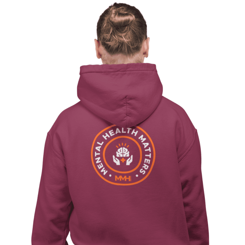 Person wearing Mental Health Matters hoodie backwards