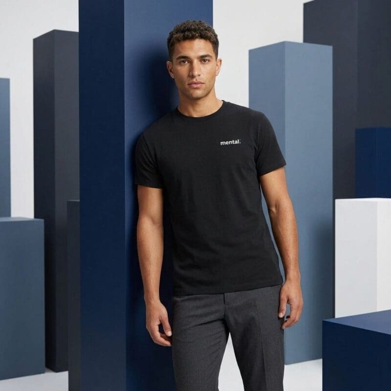 Man in black T-shirt against blue blocks