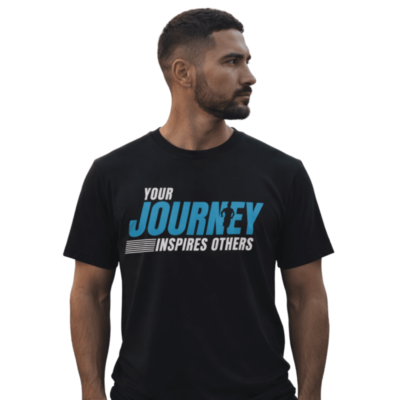 Man wearing 'Your Journey Inspires Others' T-shirt.