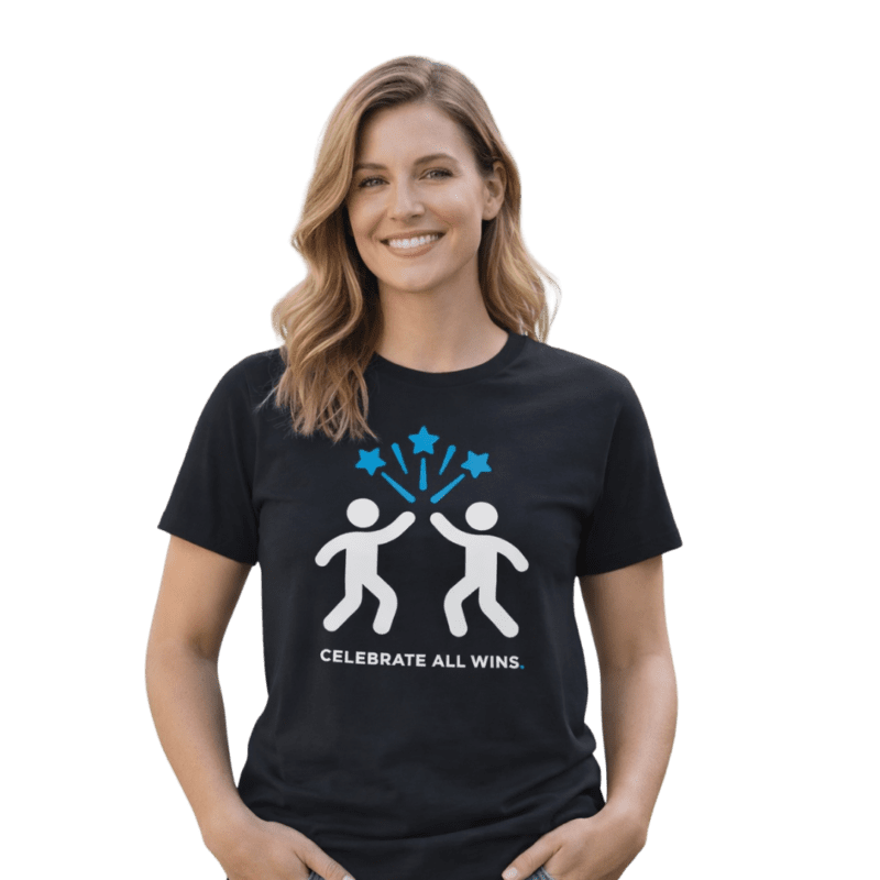 Woman wearing t-shirt with celebratory graphic.
