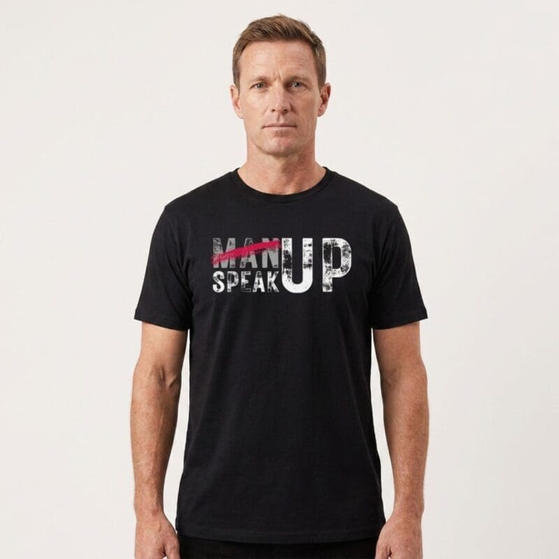 Man wearing 'Speak Up' slogan T-shirt