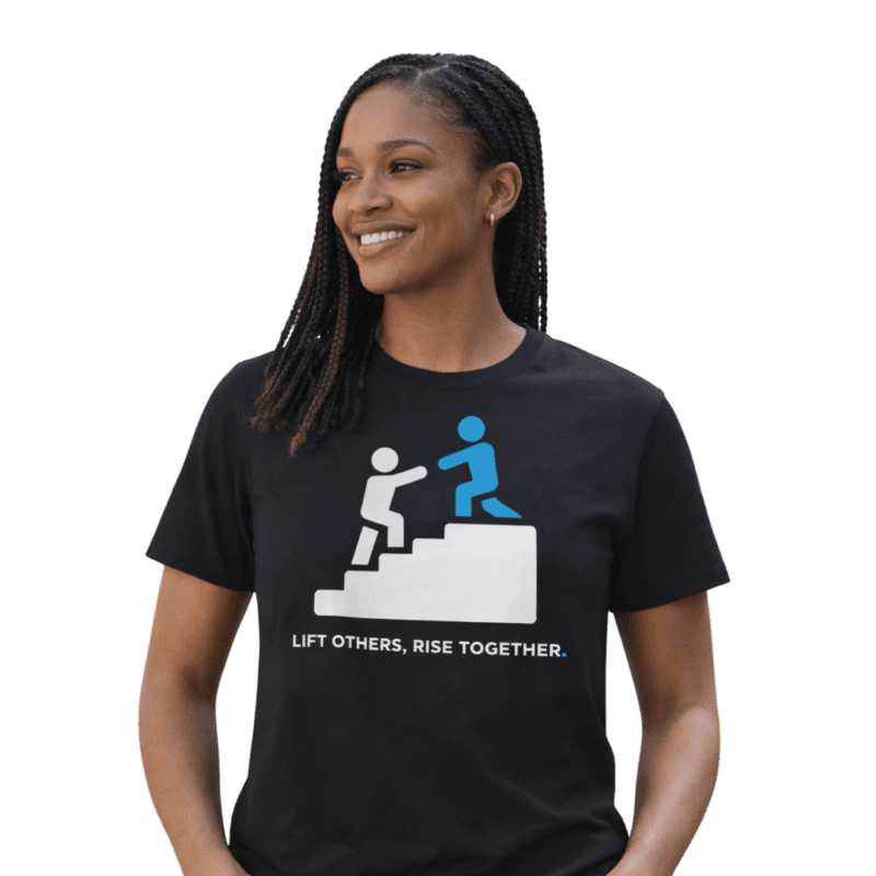 Smiling woman wearing teamwork message t-shirt.