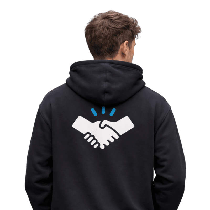 Person wearing hoodie with handshake graphic on back.