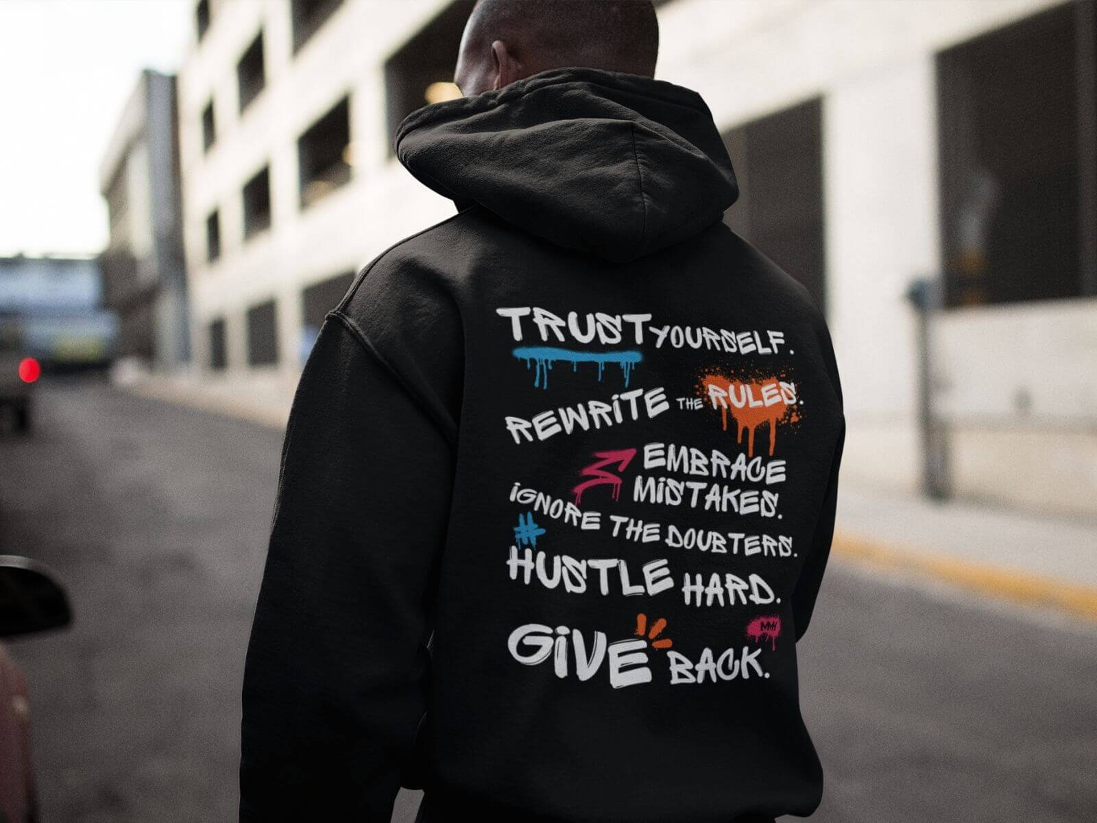 Rules for Life Statement Hoodie by MMH Clothing Person wearing a black Rules for Life hoodie with bold back print featuring motivational statements like trust yourself and give back.