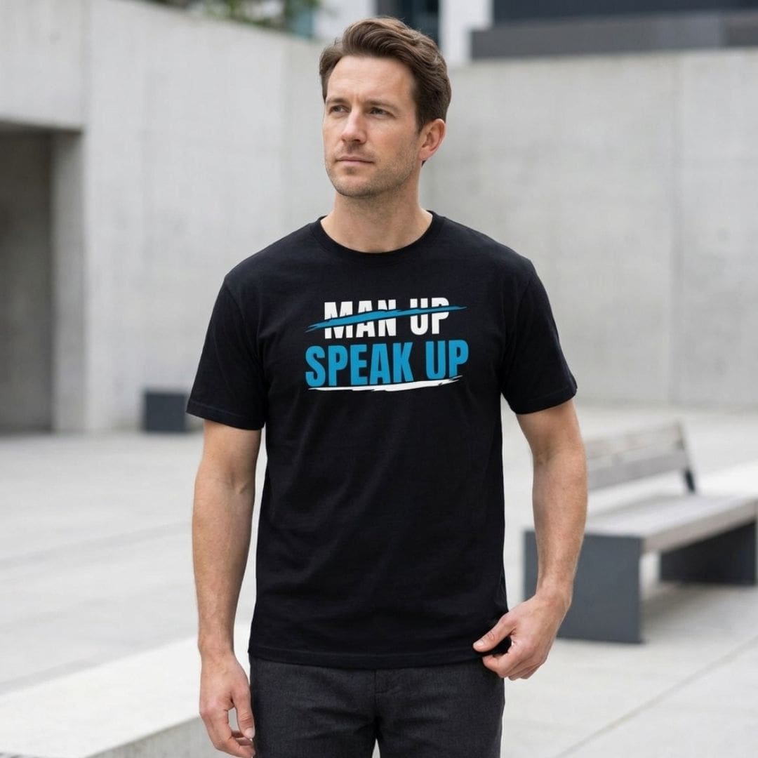 Man wearing ‘Speak Up’ slogan T-shirt outdoors