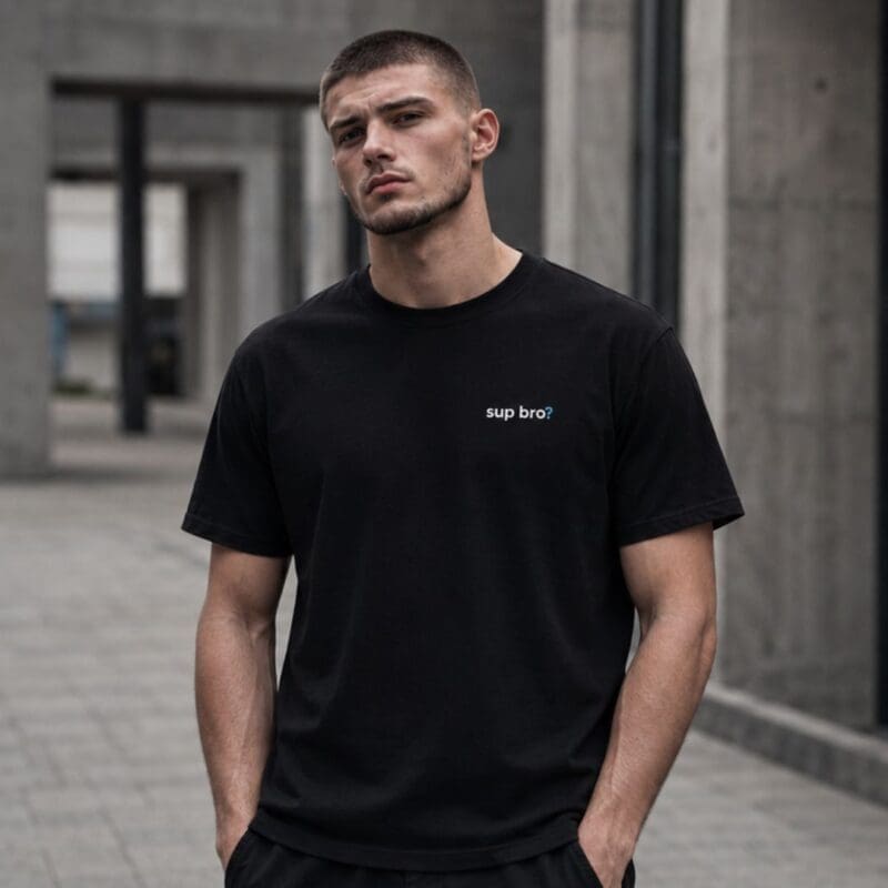 Man in black 'sup bro?' T-shirt