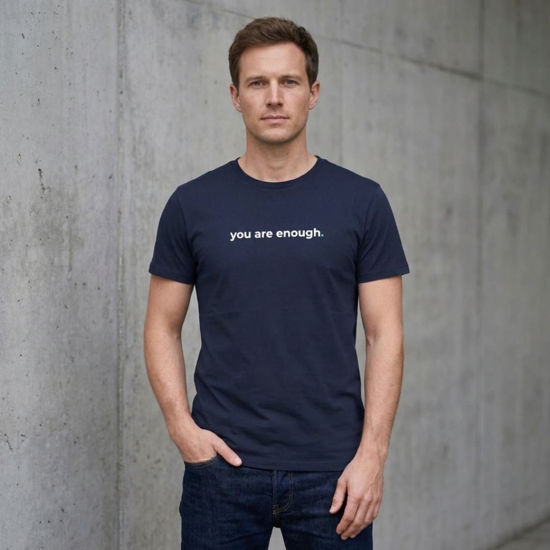 Man wearing 'you are enough' T-shirt
