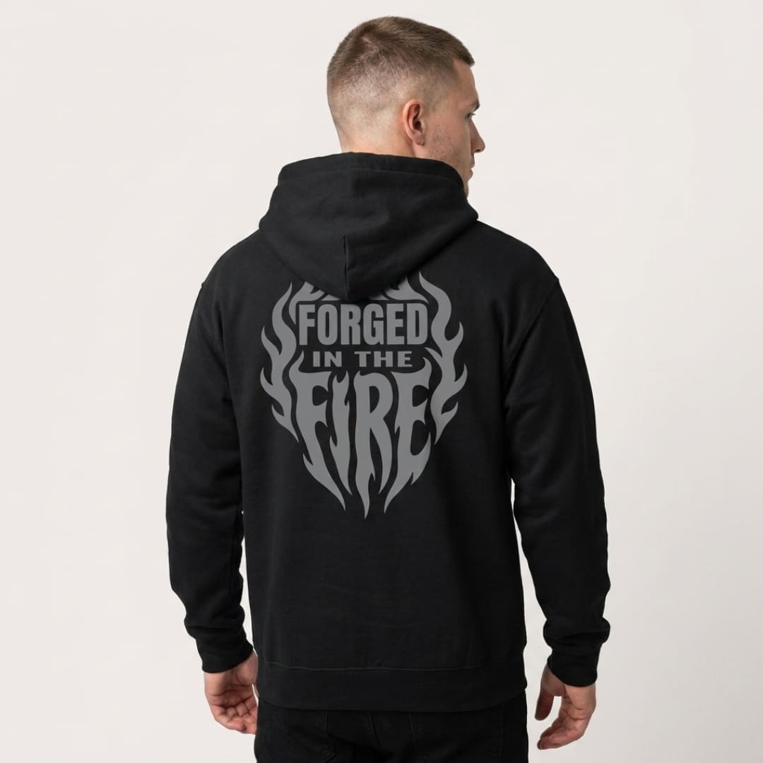 Man wearing black hoodie with flame slogan design