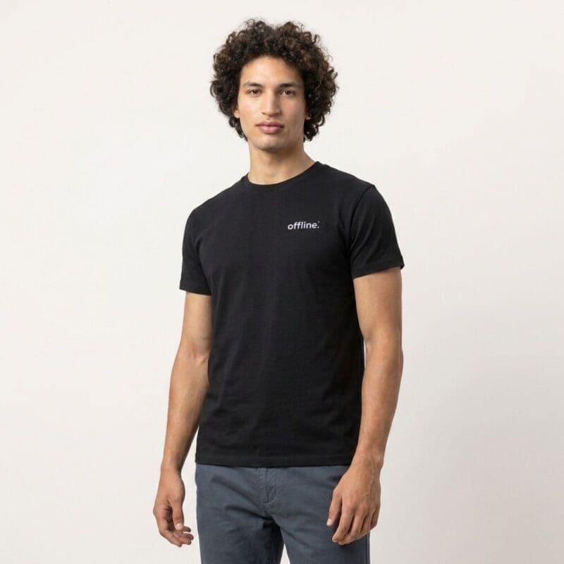 Man wearing black offline slogan T-shirt