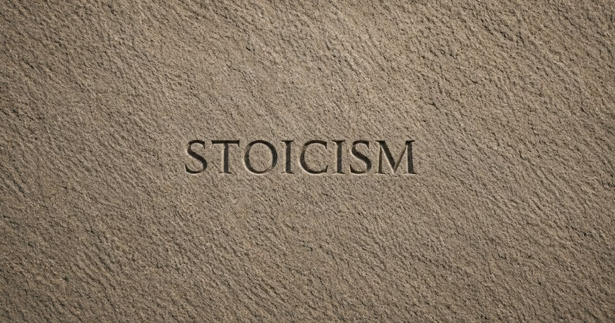 Stoicism engraved on textured stone surface