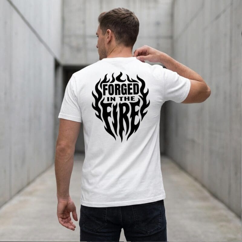 Man wearing 'Forged in the Fire' T-shirt